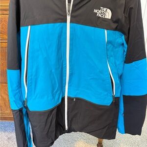 The North Face Men's Performance Jacket in Blue and Black